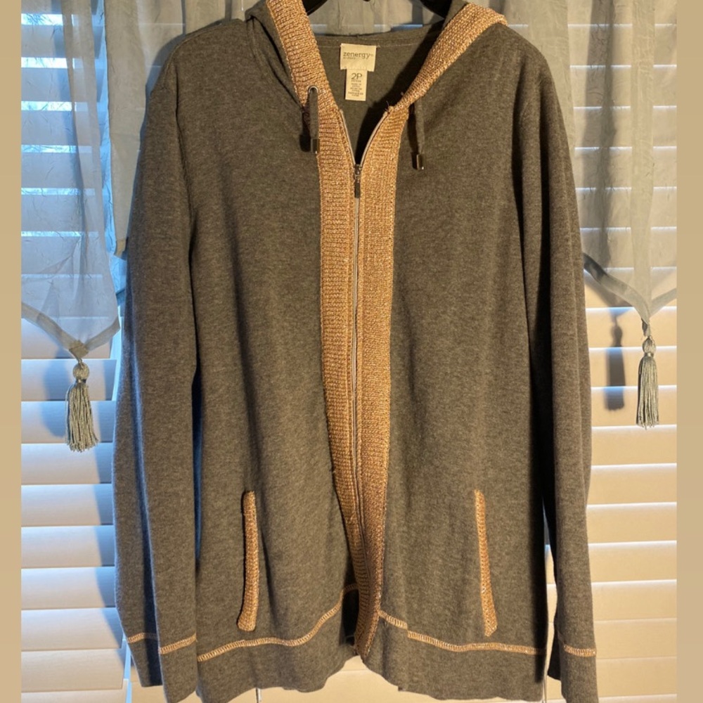 grey zip-up jacket with pink and silver trim